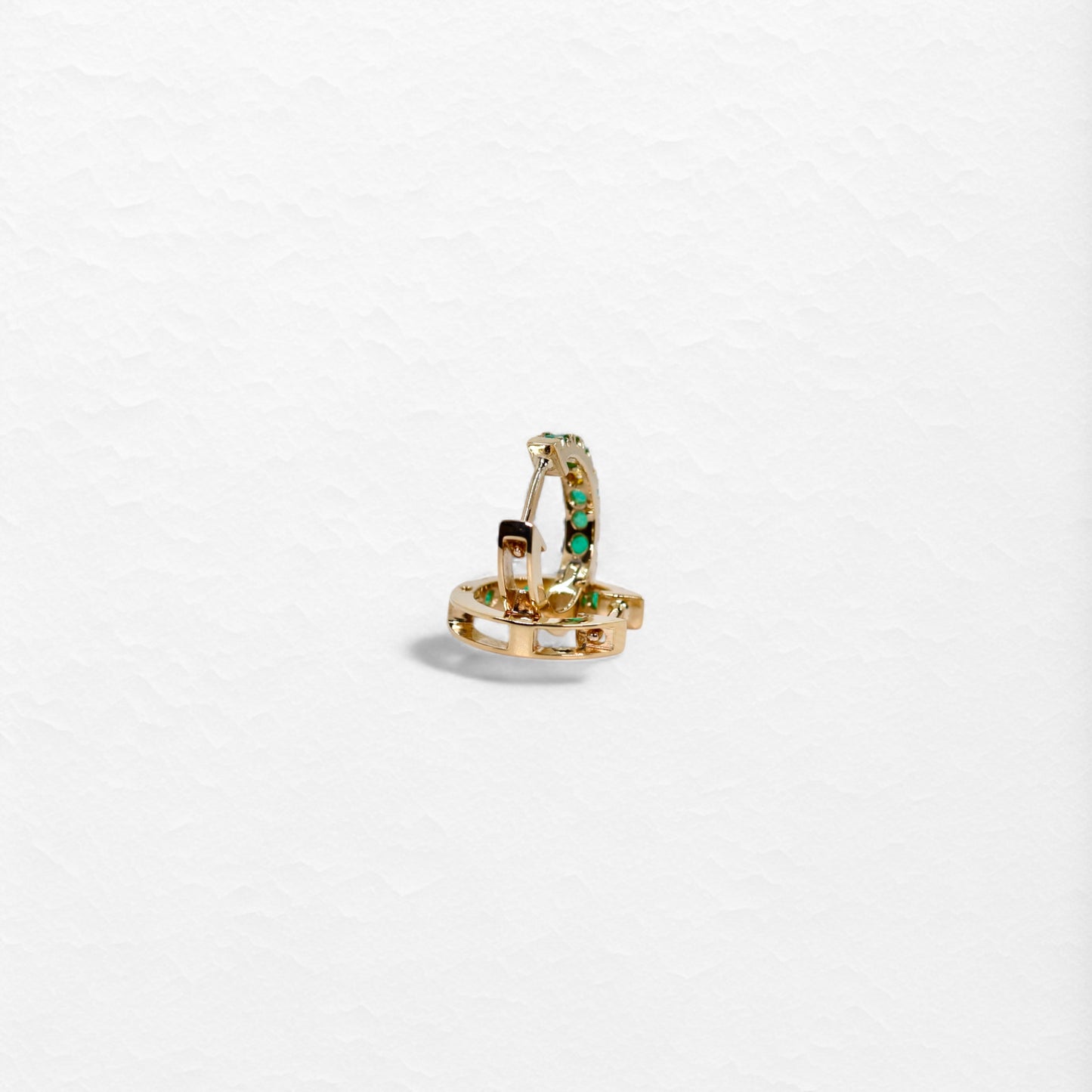 Opulence Huggies Medium with a Twist in Yellow Gold